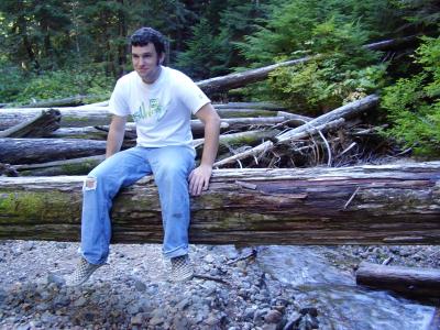 upon a log by a delicious stream at mt. rainier.