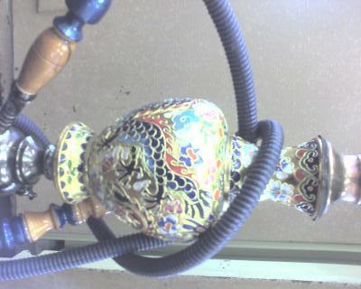 First piece above the base under the brass piece